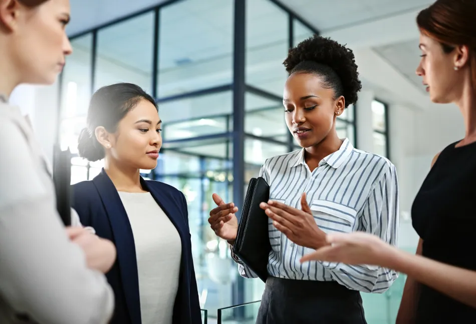 Businesswomen discussing egg freezing and fertility preservation